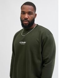 dunkelgrüner Pullover mit einem Rundhalsausschnitt von Jack & Jones PlusSize