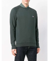 dunkelgrüner Pullover mit einem Rundhalsausschnitt von MAISON KITSUNÉ