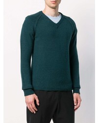 dunkelgrüner Pullover mit einem V-Ausschnitt von Nuur