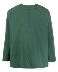 dunkelgrünes Langarmshirt mit einer Knopfleiste von Homme Plissé Issey Miyake