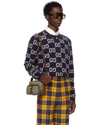 dunkellila bedruckter Pullover mit einem Rundhalsausschnitt von Gucci