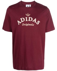 dunkellila bedrucktes T-Shirt mit einem Rundhalsausschnitt von adidas