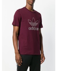 dunkellila bedrucktes T-Shirt mit einem Rundhalsausschnitt von adidas