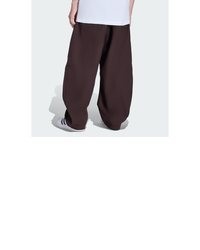 dunkellila Cargohose von adidas Originals