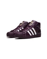 dunkellila hohe Sneakers aus Leder von adidas