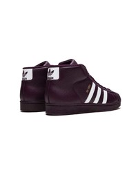 dunkellila hohe Sneakers aus Leder von adidas