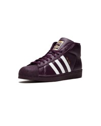 dunkellila hohe Sneakers aus Leder von adidas