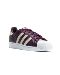 dunkellila Leder niedrige Sneakers von adidas