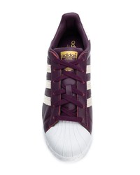 dunkellila Leder niedrige Sneakers von adidas