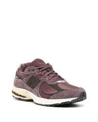 dunkellila niedrige Sneakers von New Balance