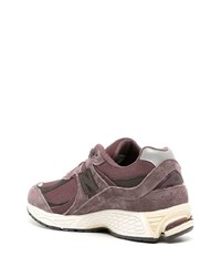 dunkellila niedrige Sneakers von New Balance