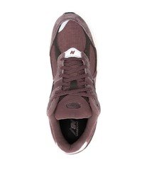 dunkellila niedrige Sneakers von New Balance