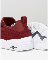 dunkelrote Turnschuhe von Puma