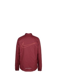 dunkelroter Pullover mit einem Reißverschluss am Kragen von Nike