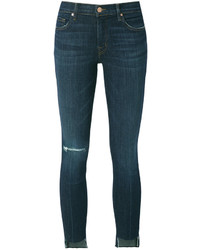 dunkeltürkise Jeans mit Destroyed-Effekten