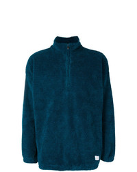 dunkeltürkiser Pullover mit einem Reißverschluss am Kragen von The Silted Company