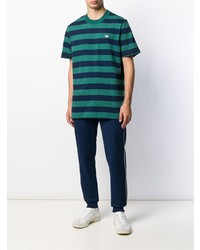 dunkeltürkises horizontal gestreiftes T-Shirt mit einem Rundhalsausschnitt von adidas