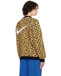 gelbe Strickjacke mit Leopardenmuster von Nike