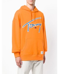 gelber bedruckter Pullover mit einem Kapuze von Tommy Jeans