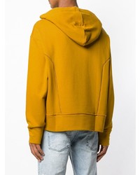 gelber bedruckter Pullover mit einem Kapuze von Reebok By Pyer Moss