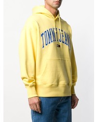 gelber bedruckter Pullover mit einem Kapuze von Tommy Jeans