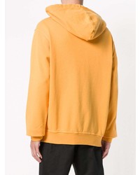 gelber bedruckter Pullover mit einem Kapuze von Maison Margiela