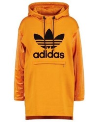 gelber bedruckter Pullover mit einer Kapuze von adidas
