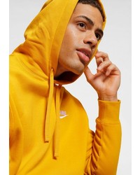 gelber Pullover mit einem Kapuze von Nike Sportswear
