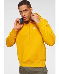 gelber Pullover mit einem Kapuze von Nike Sportswear