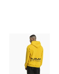 gelber Pullover mit einem Kapuze von Puma