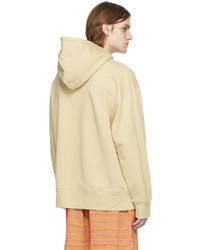 gelber Pullover mit einem Kapuze von Acne Studios