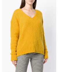 gelber Pullover mit einem V-Ausschnitt von Tela