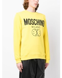 gelbes bedrucktes Sweatshirt von Moschino