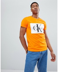 gelbes bedrucktes T-Shirt mit einem Rundhalsausschnitt von Calvin Klein Jeans