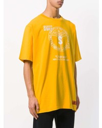 gelbes bedrucktes T-Shirt mit einem Rundhalsausschnitt von Heron Preston