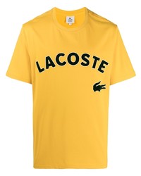 gelbes bedrucktes T-Shirt mit einem Rundhalsausschnitt von Lacoste