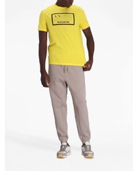 gelbes bedrucktes T-Shirt mit einem Rundhalsausschnitt von Armani Exchange