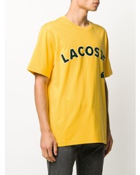 gelbes bedrucktes T-Shirt mit einem Rundhalsausschnitt von Lacoste