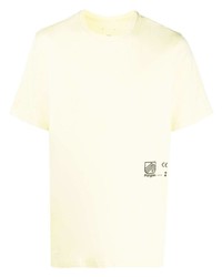 gelbes bedrucktes T-Shirt mit einem Rundhalsausschnitt von Oamc