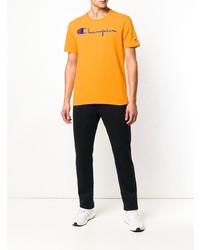 gelbes bedrucktes T-Shirt mit einem Rundhalsausschnitt von Champion