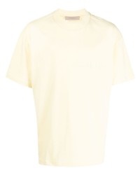 gelbes T-Shirt mit einem Rundhalsausschnitt von FEAR OF GOD ESSENTIALS