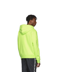 gelbgrüner Pullover mit einem Kapuze von Off-White