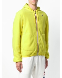gelbgrüner Pullover mit einem Kapuze von K-Way