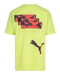 gelbgrünes bedrucktes T-Shirt mit einem Rundhalsausschnitt von Puma