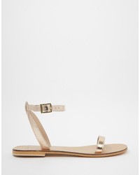 goldene flache Sandalen aus Leder von Asos