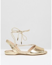 goldene flache Sandalen von Aldo