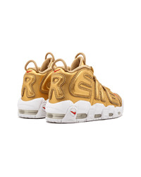 goldene hohe Sneakers von Nike