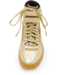 goldene hohe Sneakers von Puma