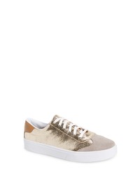 goldene Leder niedrige Sneakers mit Schlangenmuster