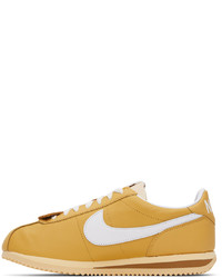 goldene Leder Sportschuhe von Nike